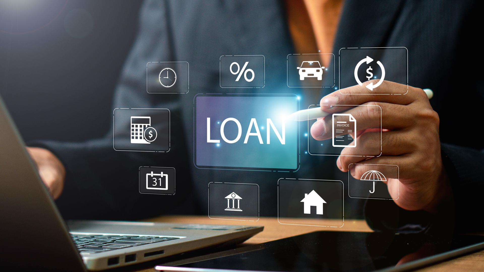 Asian businesswoman discusses home purchase contracts with clients at her desk, focusing on loans, mortgages, and other financial aspects of real estate transactions.