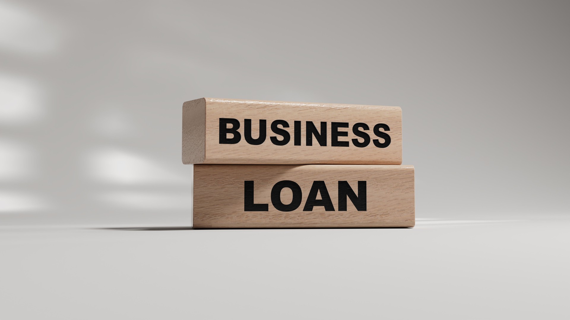 Time to business loan. Concept words 'business loan' on wooden blocks. Business loan concept.3D rendering on white background. wooden blocks.